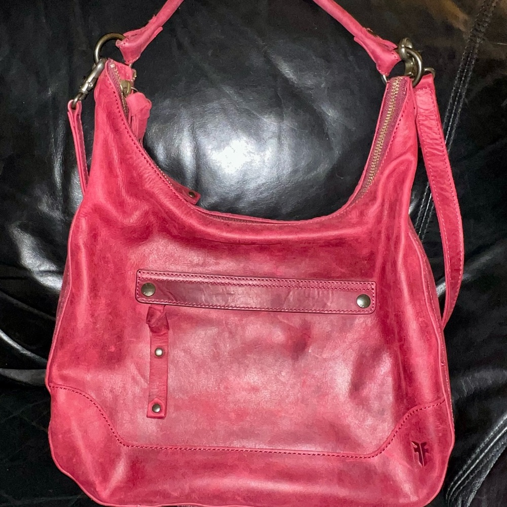 Distressed leather Frye over the shoulder with additional strap for crossbody.